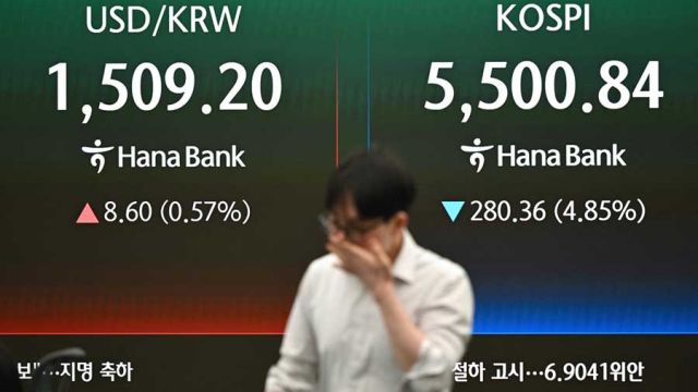 AFP__20260323__A4C87WF__v2__MidRes__SkoreaEconomyCurrency.jpg