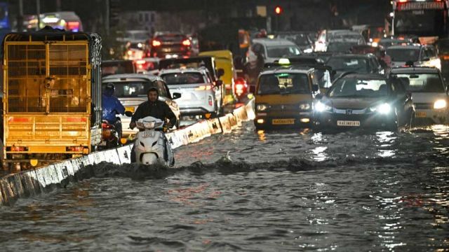 AFP__20260429__A9CE86Y__v1__MidRes__IndiaWeatherRain.jpg