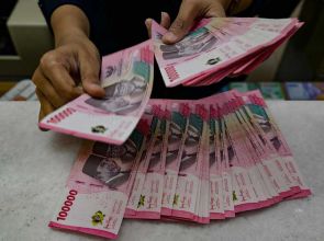 Indonesian rupiah slides to record 18,000 low, 2026 losses deepen