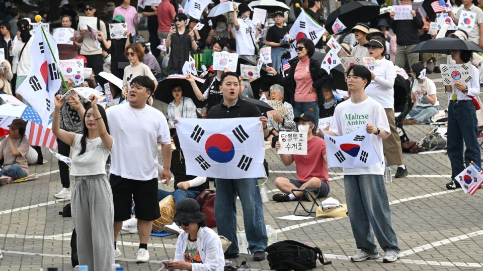 AFP__20260610__B6K49CR__v1__MidRes__SkoreaElectionProtest.jpg