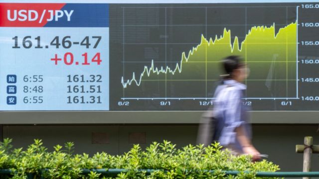AFP__20260622__B7TZ364__v1__MidRes__JapanEconomyForex.jpg