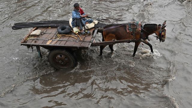 AFP__20260707__B9J4966__v2__MidRes__PakistanWeatherFlood-1.jpg
