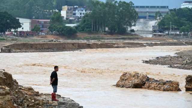 AFP__20260708__B9M66UE__v2__MidRes__TopshotChinaWeatherFlood.jpg