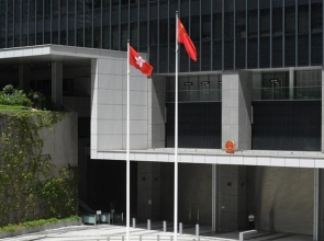 Hong Kong calls for fair handling of UK case against trade officer, 2 others
