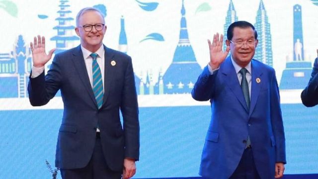 australian_prime_minister_anthony_albanese_and_prime_minster_hun_sen_wave_at_the_2022_asean_summit_in_phnom_penh._hong_menea.jpg