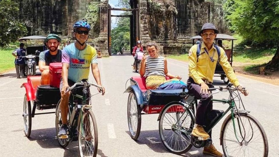 bo_sophea_right_and_his_friend_are_bringing_old-fashioned_bicycle_remorques_back_to_life_as_an_enchanting_and_eco-friendly_mode_of_transport._supplied.jpg