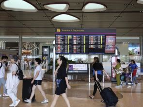 Trade tensions, political uncertainty dim air travel outlook; record traveller forecast trimmed