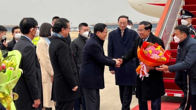 chinese_officials_welcome_prime_minister_hun_sen_second_right_upon_arrival_in_beijing_on_february_9._spm.jpg
