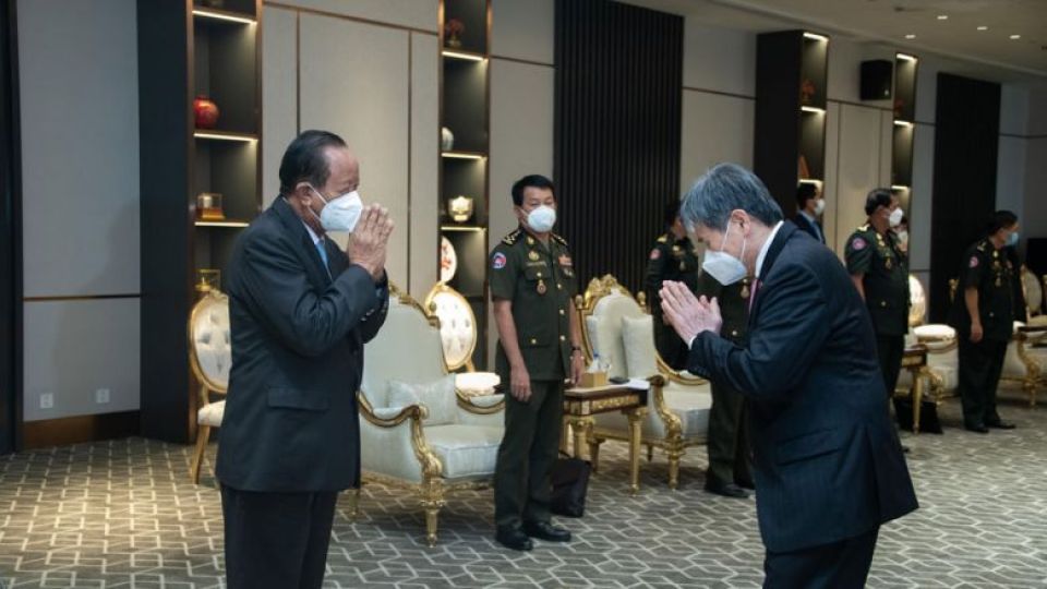 defence-minister-tea-banh-left-greets-asean-secretary-general-lim-jock-hoi-in-phnom-penh-on-monday.-tea-banh-via-facebook.jpg