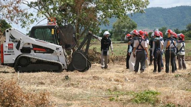 deminers_use_heavy_machinery_to_clear_mine_fields_in_a_rural_provincial_area._ly_thuch.jpg