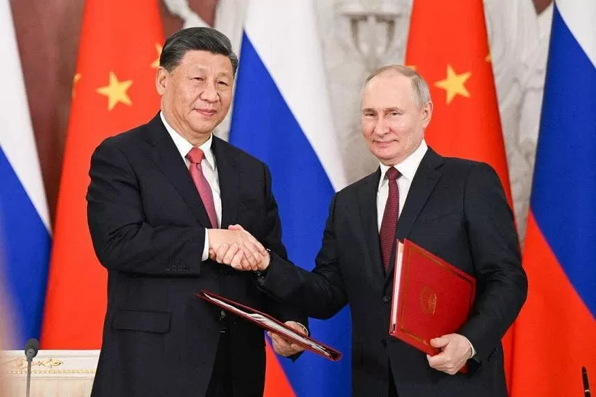 dw-xi-putin-230327_1.webp