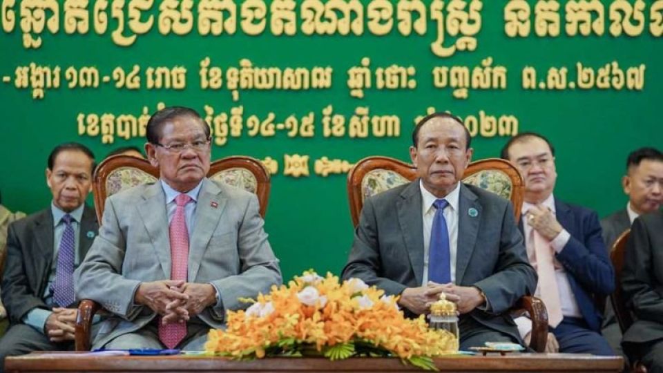 interior_minister_sar_kheng_left_and_nec_chairman_prach_chan_during_the_closing_of_a_meeting_held_to_summarise_the_necs_electoral_work_in_battambang_province_on_august_15._battambang_administration.jpg
