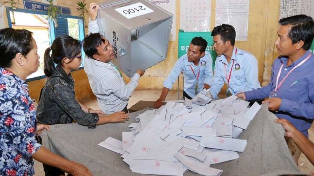 polling_station_workers_count_votes_at_koh_sdach_commune_in_the_capitals_chroy_changvar_district_in_2018._hong_menea.jpg