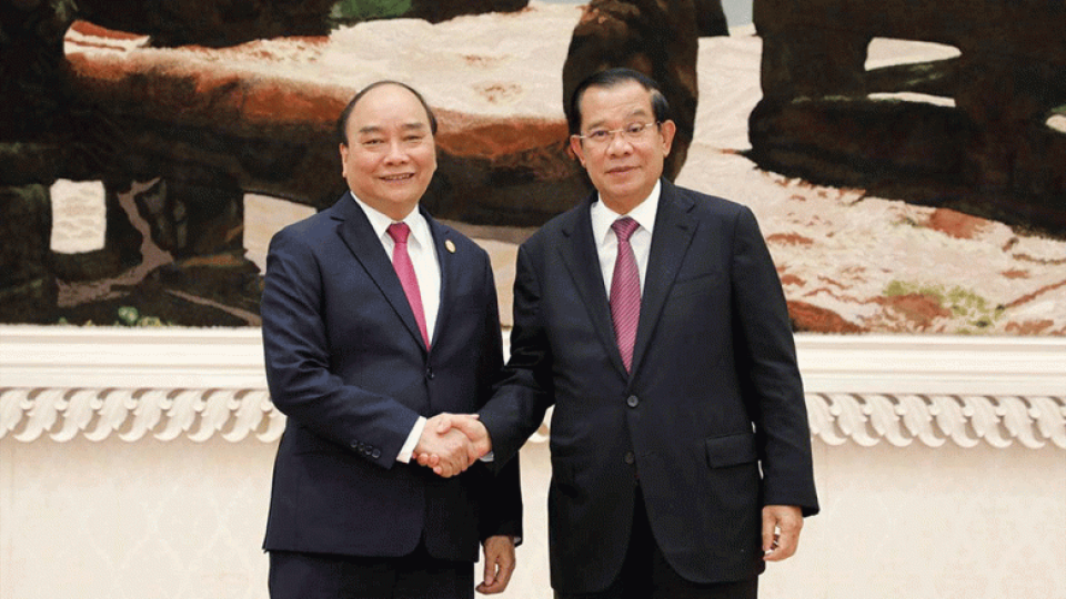 prime_minister_hun_sen_shakes_hands_with_vietnamese_president_nguyen_xuan_phuc_in_phnom_penh_in_december_last_year._spm.png