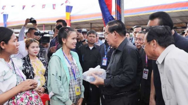 prime_minister_hun_sen_talks_to_pregnant_factory_workers_in_takeo_province_in_june._spm.jpg