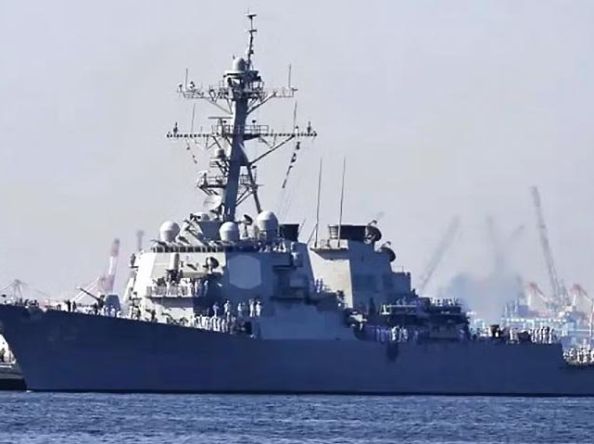 China warns US warship to leave S China Sea