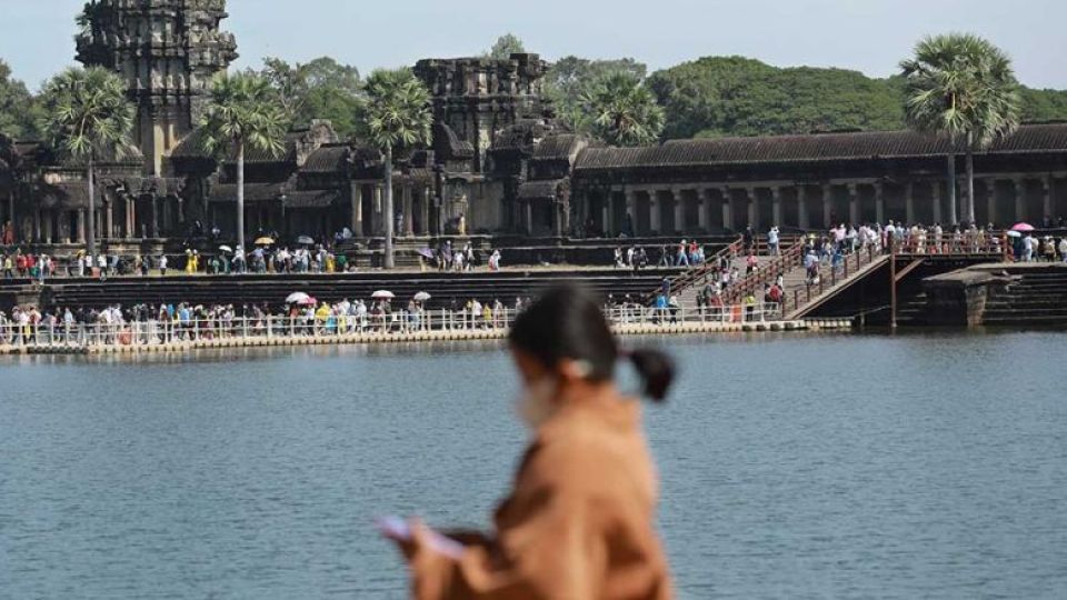 tourists_visit_angkor_wat_earlier_this_year_after_the_kingdom_rolled_back_covid-19_restrictions._hong_menea.jpg