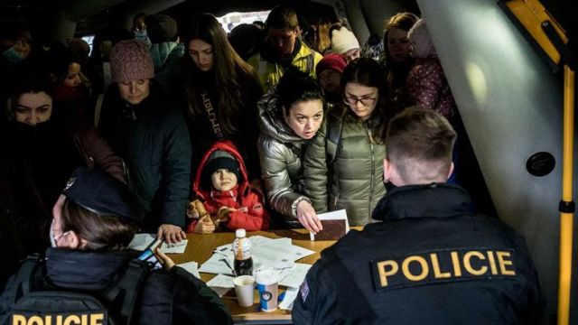 ukrainian_refugees_queue_to_file_for_residency_permits_at_the_foreign_police_headquarters_in_prague_czech_republic_on_wednesday._the_number_of_refugees_fleeing_the_conflict_i.jpg